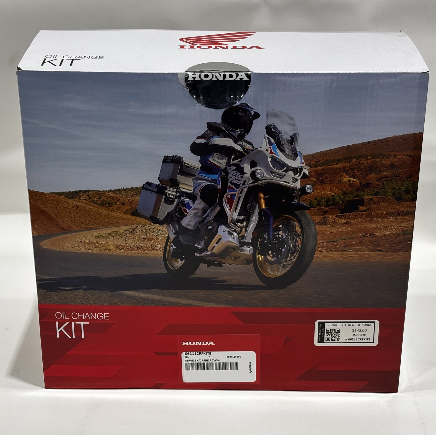 Honda oil change kit box with motorcycle graphic on a white background
